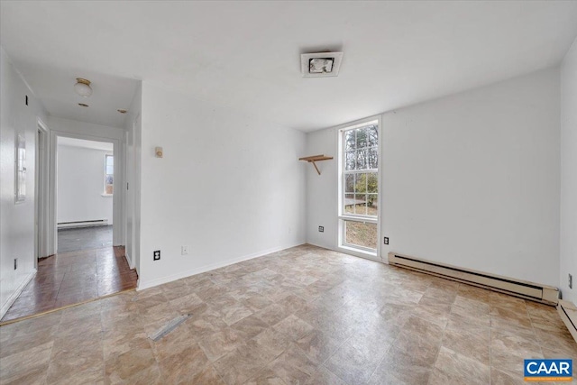 2420 James River Rd, Esmont, VA 22937 - spare room featuring a baseboard heating unit, baseboards, and plenty of natural light