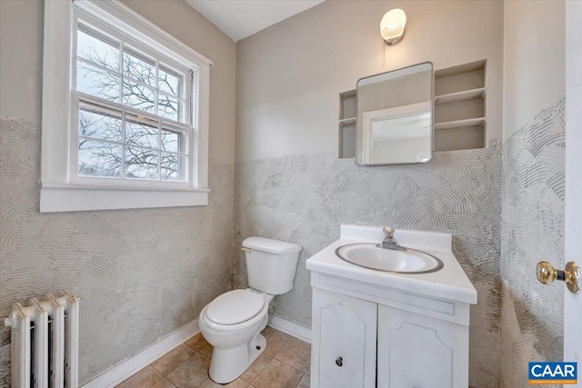 2420 James River Rd, Esmont, VA 22937 - bathroom featuring toilet, radiator, baseboards, tile patterned floors, and vanity
