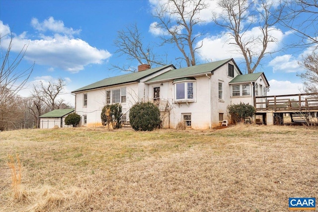 2420 James River Rd, Esmont, VA 22937 - exterior space featuring a yard, a deck, and a chimney