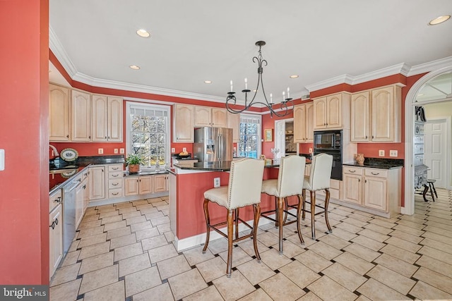 175 Covenant Way, Bumpass, VA 23024 - kitchen with black appliances, a center island, a breakfast bar, ornamental molding, and a chandelier