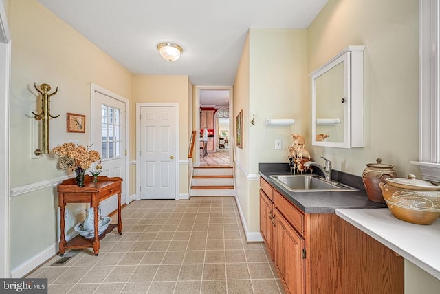 175 Covenant Way, Bumpass, VA 23024 - kitchen with dark countertops and brown cabinets