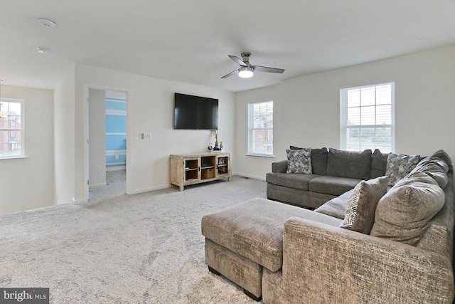 2020 Captain Dr, Fredericksburg, VA 22408 - carpeted living room featuring a ceiling fan and baseboards