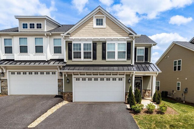 120 Ridgeline Dr, Waynesboro, VA 22980 - garage featuring washer / dryer and a garage door opener