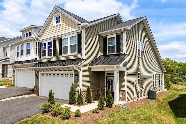 120 Ridgeline Dr, Waynesboro, VA 22980 - townhome / multi-family property featuring driveway, a standing seam roof, a garage, central AC, and stone siding