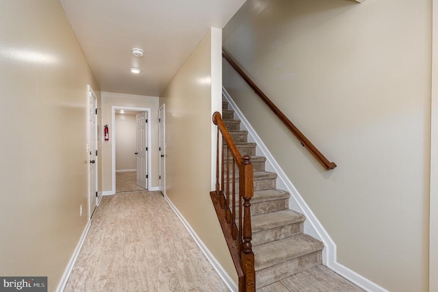 2239 Mallard Landing Dr, Fredericksburg, VA 22408 - hallway with stairway and light wood-style floors
