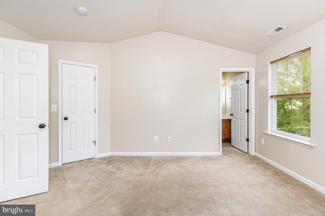 2239 Mallard Landing Dr, Fredericksburg, VA 22408 - unfurnished bedroom with lofted ceiling and light colored carpet