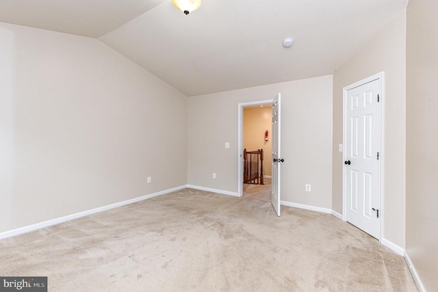 2239 Mallard Landing Dr, Fredericksburg, VA 22408 - unfurnished bedroom featuring lofted ceiling and light carpet
