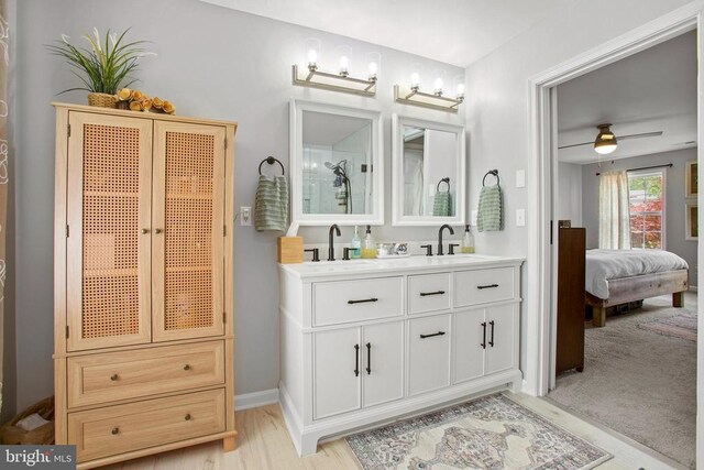 4102 Chris Shan Ct, Fredericksburg, VA 22408 - full bathroom with ceiling fan, vanity, ensuite bath, and wood finished floors