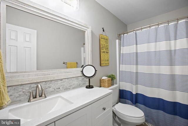 4102 Chris Shan Ct, Fredericksburg, VA 22408 - full bathroom with toilet, vanity, and a shower with curtain