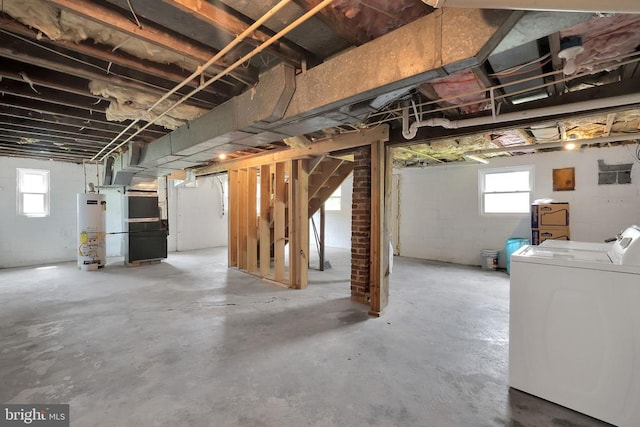 316 Wayland Rd, Culpeper, VA 22701 - basement with water heater, plenty of natural light, heating unit, and washer and dryer