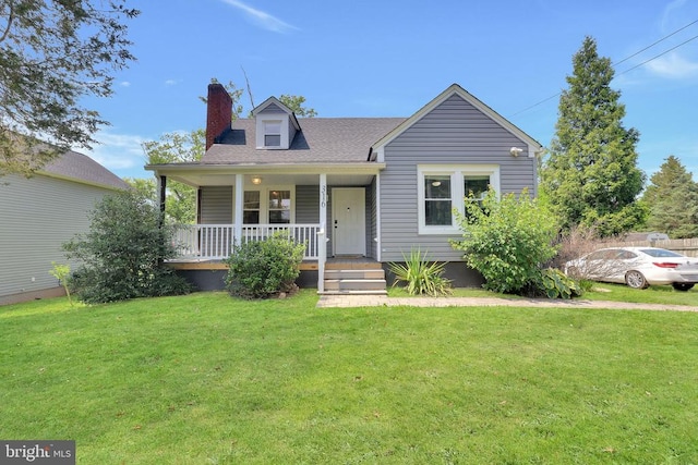 316 Wayland Rd, Culpeper, VA 22701 - view of front of home with a chimney, a porch, a front yard, and a shingled roof