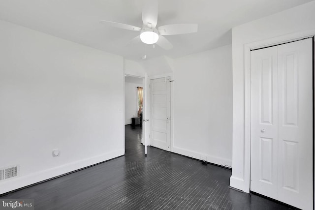 316 Wayland Rd, Culpeper, VA 22701 - unfurnished bedroom with a closet, dark wood-type flooring, and ceiling fan