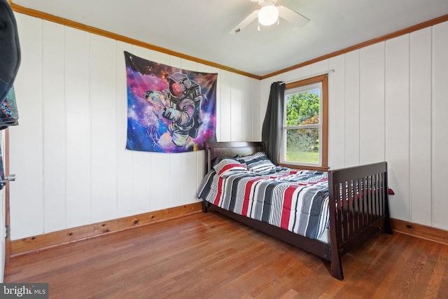 130 Morningside Dr, Culpeper, VA 22701 - bedroom with wood finished floors, ornamental molding, ceiling fan, and a decorative wall