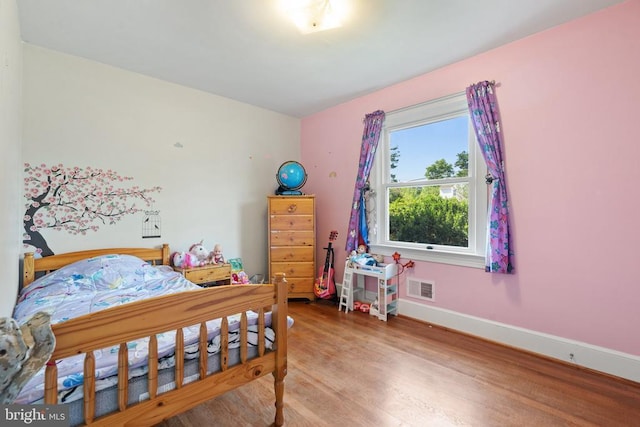 130 Morningside Dr, Culpeper, VA 22701 - bedroom featuring wood finished floors and baseboards