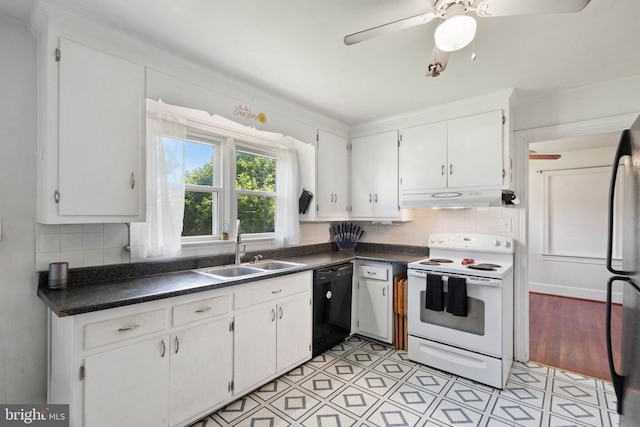 130 Morningside Dr, Culpeper, VA 22701 - kitchen featuring white electric range, black dishwasher, under cabinet range hood, dark countertops, and white cabinetry