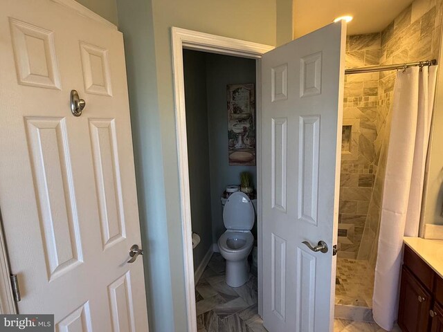 514 Constitution Blvd, Locust Grove, VA 22508 - bathroom featuring a shower stall, vanity, and toilet