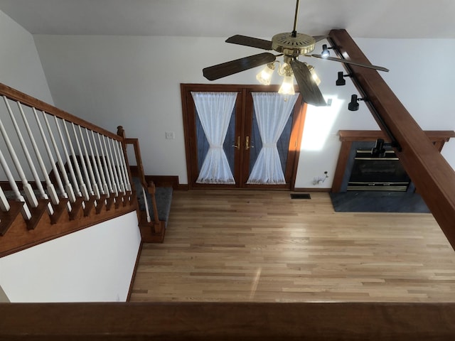 interior space featuring french doors and light wood-type flooring