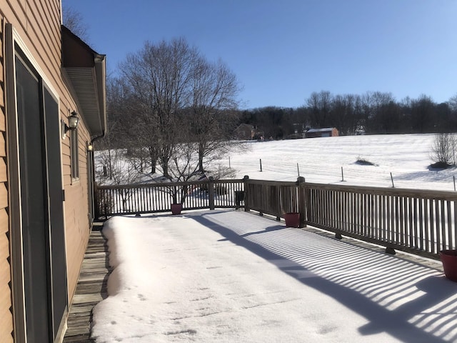 view of snow covered deck