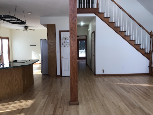 kitchen featuring hardwood / wood-style flooring and ceiling fan