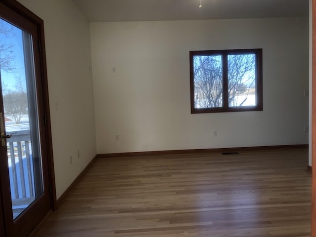 empty room featuring hardwood / wood-style floors