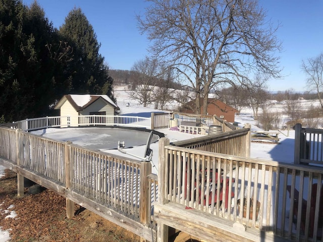 view of snow covered deck