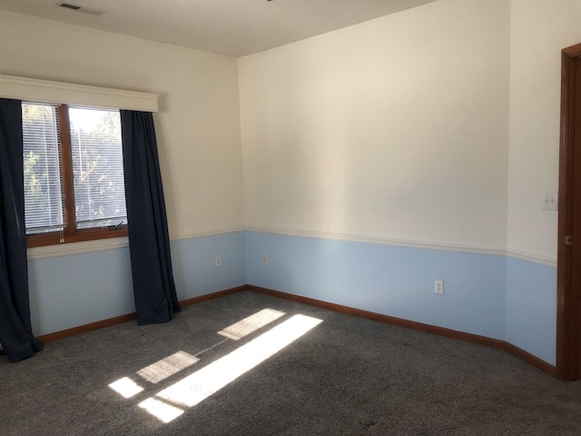 unfurnished room featuring carpet flooring