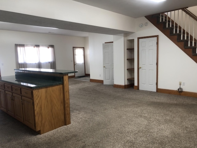 kitchen with dark carpet