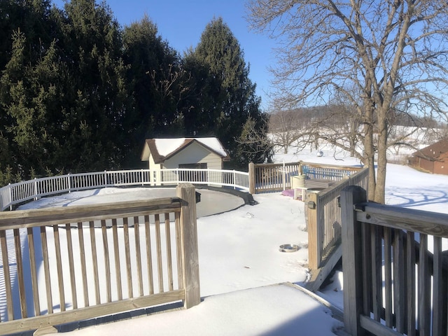 view of snow covered deck