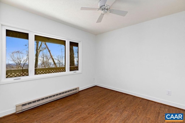 38 Firtree Dr, Wintergreen, VA 22967 - spare room featuring ceiling fan, baseboards, baseboard heating, and wood finished floors