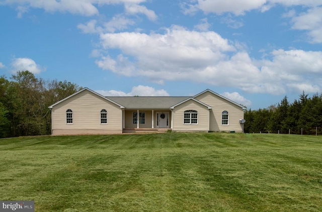  - view of front of home featuring a front lawn and a porch
