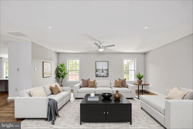  - living area featuring a ceiling fan, baseboards, recessed lighting, and light wood finished floors