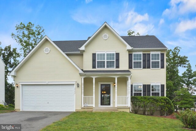 2042 Mourning Dove Dr, Locust Grove, VA 22508 - hallway with light wood finished floors, a chandelier, and stairs