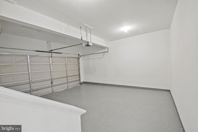 2042 Mourning Dove Dr, Locust Grove, VA 22508 - garage featuring baseboards and a garage door opener
