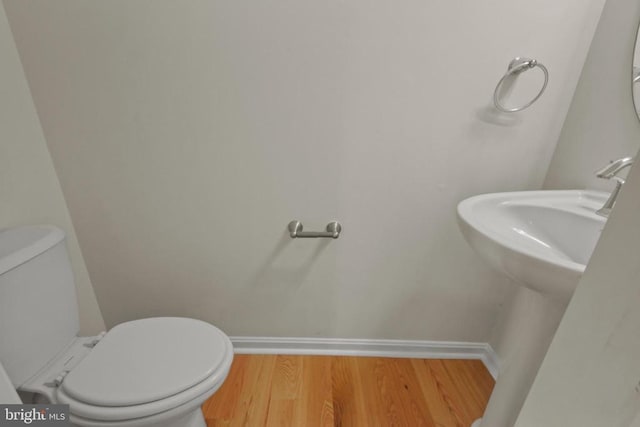 2042 Mourning Dove Dr, Locust Grove, VA 22508 - half bath with wood finished floors and toilet