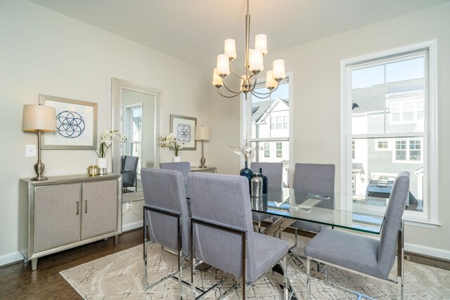 3499 Monterey Dr Unit 34F, Rockingham, VA 22801 - dining area featuring a chandelier, healthy amount of natural light, wood finished floors, and baseboards