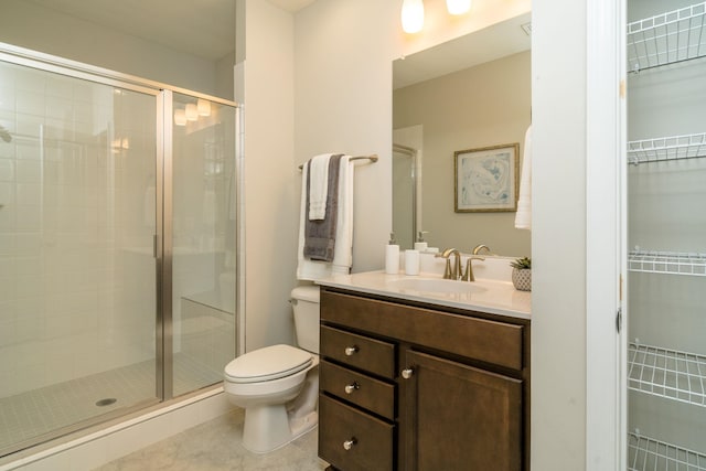 3499 Monterey Dr Unit 34F, Rockingham, VA 22801 - full bath featuring a shower stall, toilet, vanity, tile patterned floors, and a spacious closet
