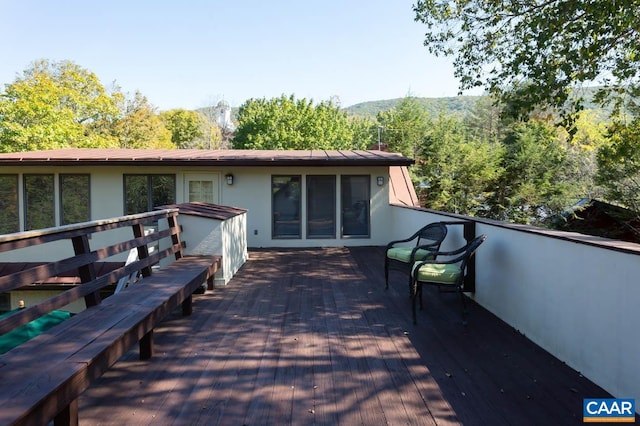 3 Old Mill Rd, Warm Springs, VA 24484 - back of house with a wooden deck and stucco siding