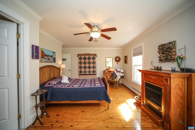 325 Union Run, Lexington, VA 24450 - bedroom with a baseboard radiator, ornamental molding, light wood-type flooring, a glass covered fireplace, and a ceiling fan