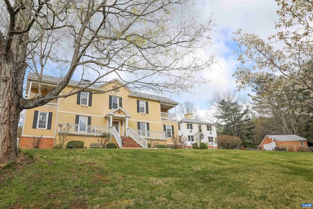 325 Union Run, Lexington, VA 24450 - view of front of house featuring a front yard, brick siding, and a wooden deck