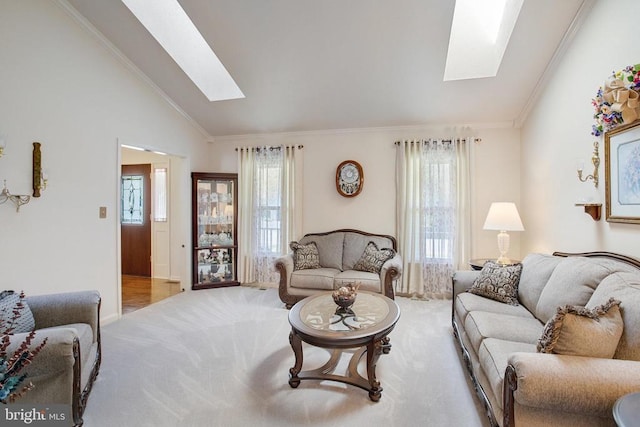 11911 Smoketree Blvd, Fredericksburg, VA 22407 - carpeted living area featuring ornamental molding, a wealth of natural light, and lofted ceiling with skylight