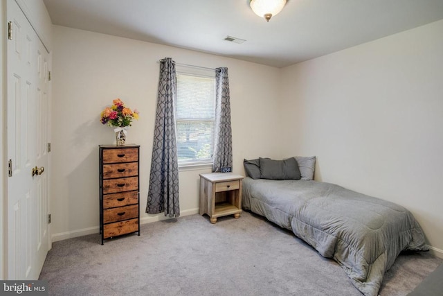 11911 Smoketree Blvd, Fredericksburg, VA 22407 - bedroom with baseboards, light carpet, and visible vents