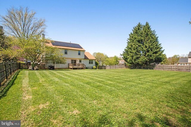 11911 Smoketree Blvd, Fredericksburg, VA 22407 - view of yard with a wooden deck and a fenced backyard