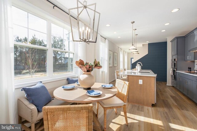 10501 Afton Grove Ct, Fredericksburg, VA 22408 - dining space with plenty of natural light, a chandelier, wood finished floors, and recessed lighting