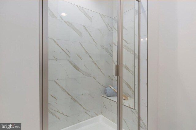10501 Afton Grove Ct, Fredericksburg, VA 22408 - bathroom featuring a marble finish shower