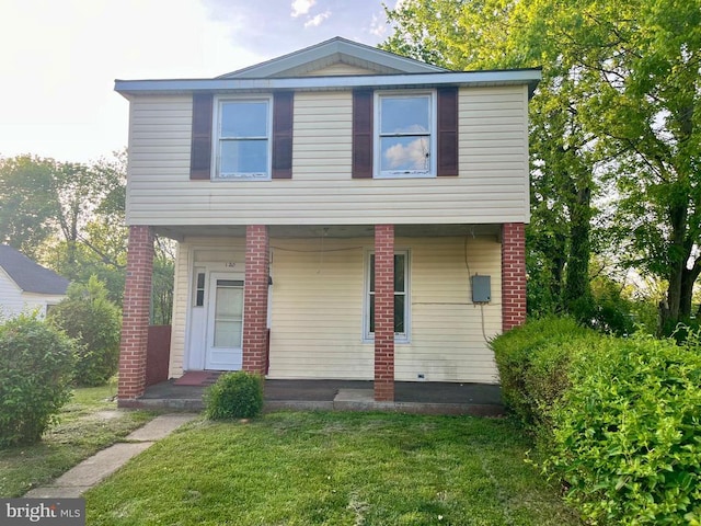 120 Charles St, Gordonsville, VA 22942 - view of front facade featuring covered porch and a front yard