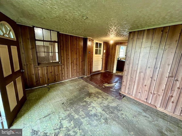 120 Charles St, Gordonsville, VA 22942 - spare room featuring wooden walls and a textured ceiling
