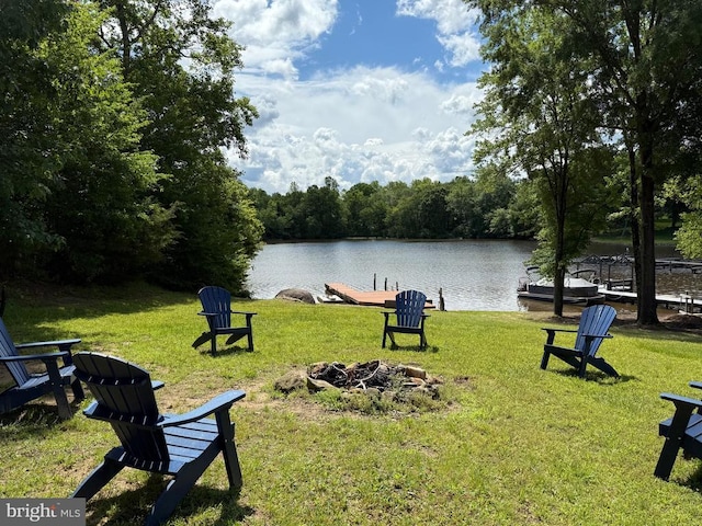 198 Miltons Ln, Louisa, VA 23093 - view of community with a fire pit, a water view, a lawn, and a wooded view