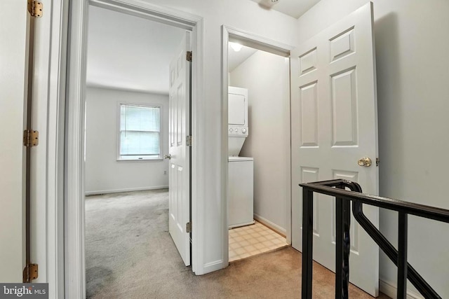 7637 Wankoma Dr, Remington, VA 22734 - hall with stacked washer / dryer, light colored carpet, and an upstairs landing