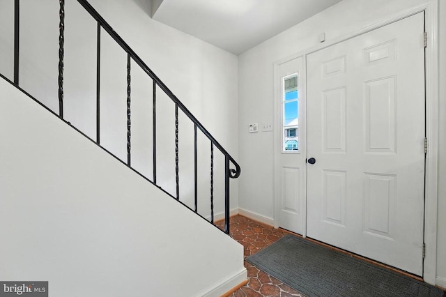7637 Wankoma Dr, Remington, VA 22734 - entryway with stairs and dark tile patterned flooring