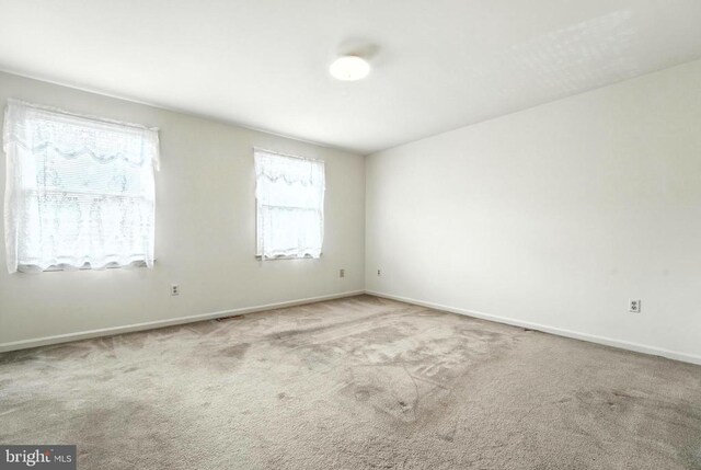 7637 Wankoma Dr, Remington, VA 22734 - spare room featuring carpet and baseboards